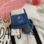 Bolso-De-Lona-Con-Estampado-De-Dibujos-Animados-Para-Mujer-Bandolera-De-Hombro-Con-Solapa-Informal-3.Webp