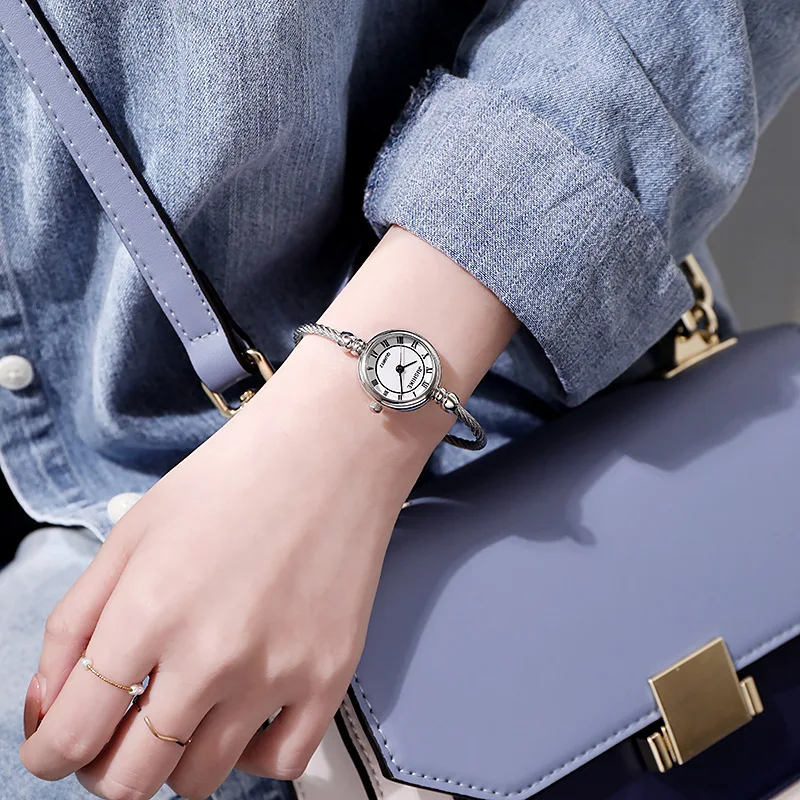 A Person Wearing A Watch