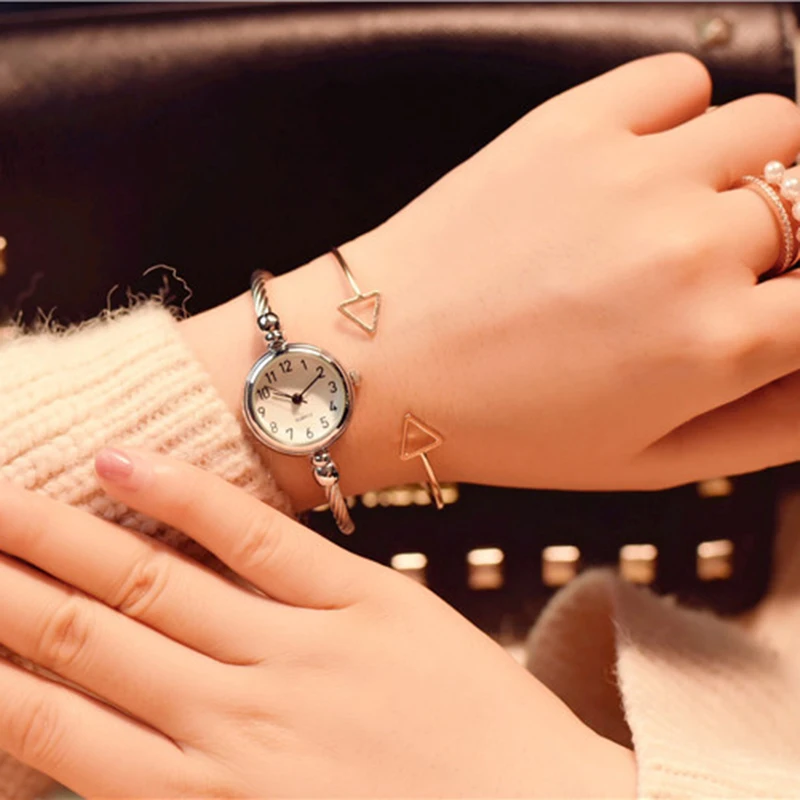 A Woman Wearing A Watch