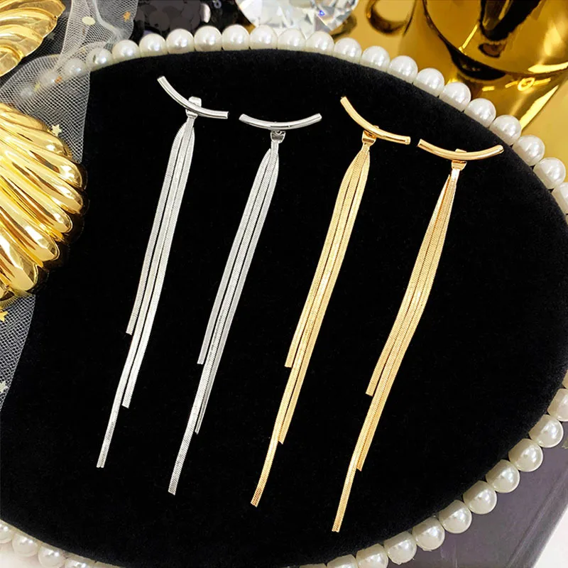 Pendientes colgantes de corazón y estrella: elegancia femenina