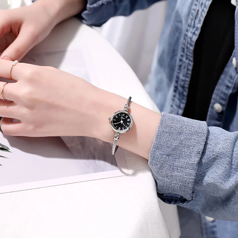 A Person Wearing A Watch