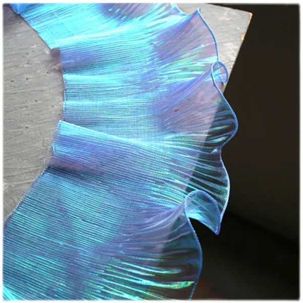 Imagen del producto Tela de encaje azul plisada: elegancia y estilo para mujeres | Compra online en Tiendafiable