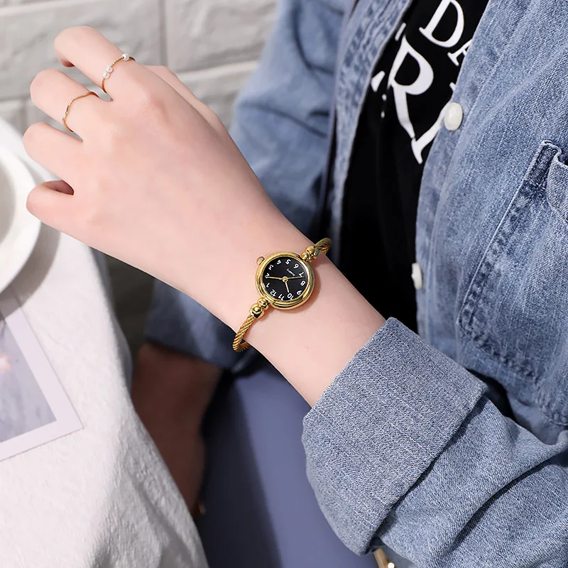 A Person Wearing A Watch
