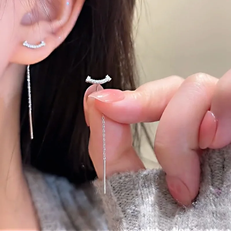 Pendientes colgantes de corazón y estrella: elegancia femenina