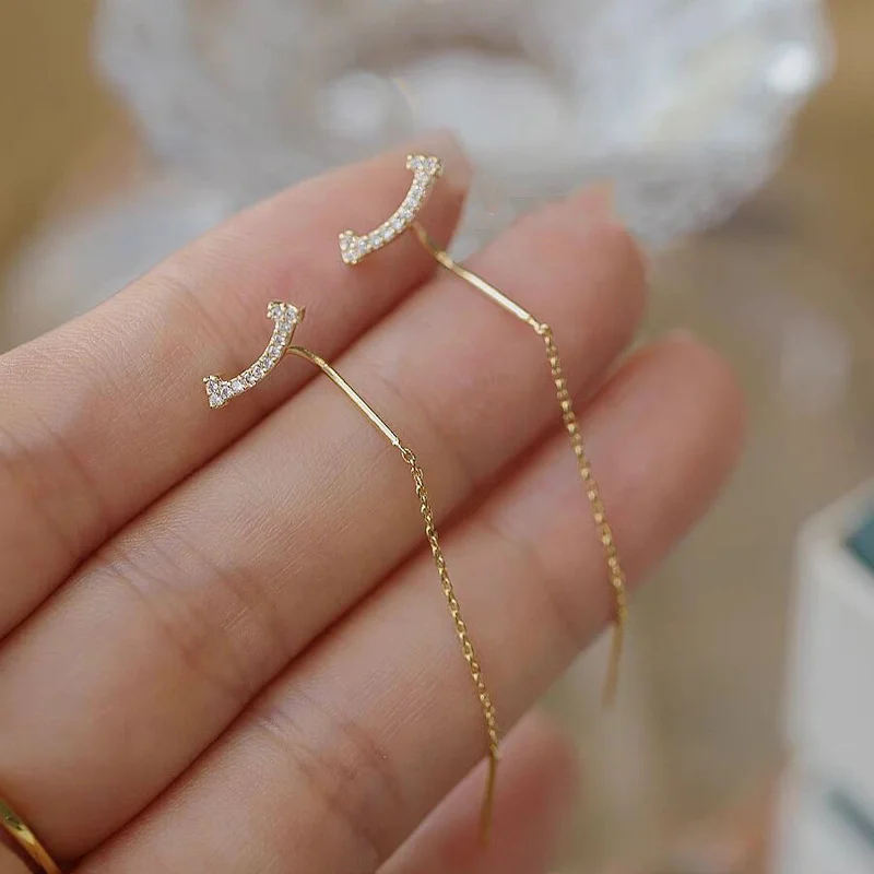 Pendientes colgantes de corazón y estrella: elegancia femenina