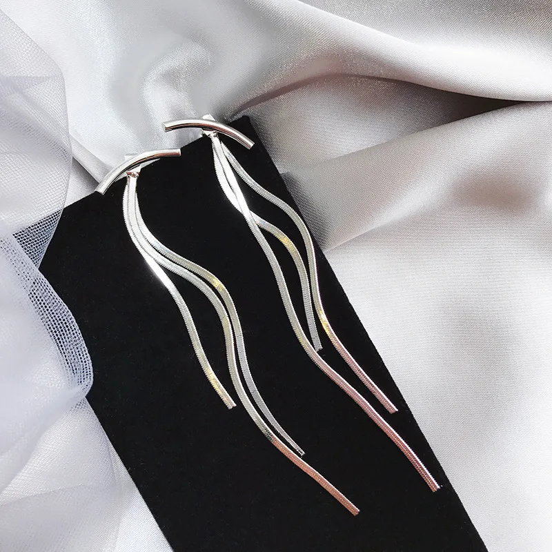 Pendientes colgantes de corazón y estrella: elegancia femenina