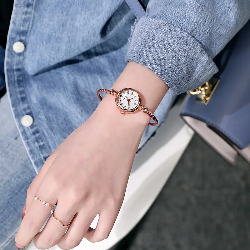 A Person Wearing A Watch