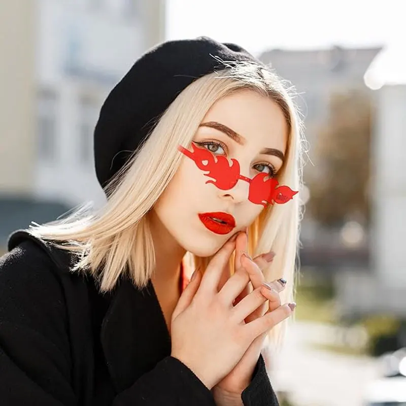 A Woman With Red Lips And Red Glasses