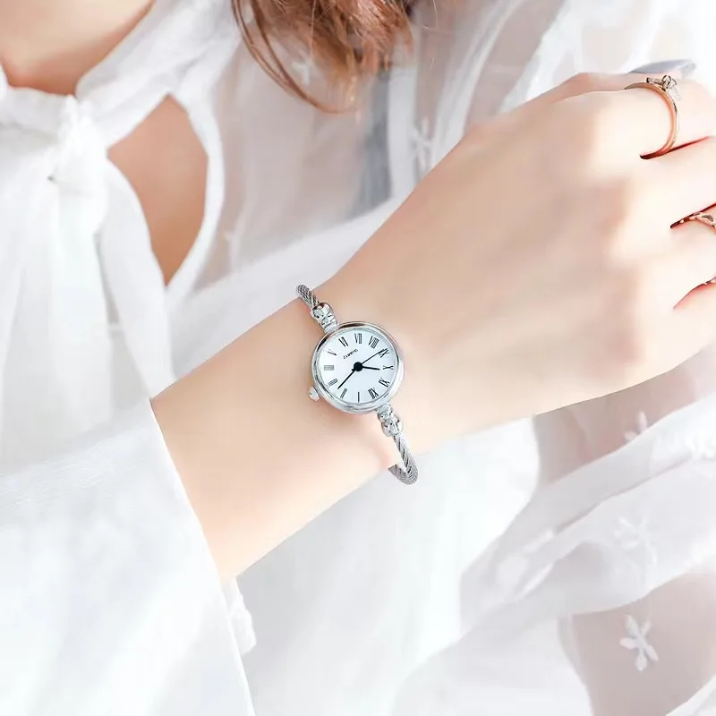 A Woman Wearing A Watch