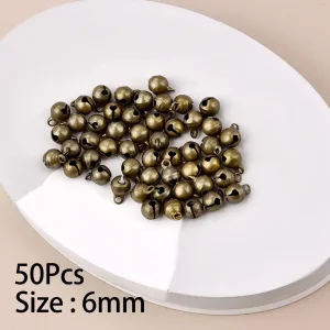 Imagen del producto Mini colgante de cascabel dorado de aluminio para decoración de árbol de Navidad | Compra online en Tiendafiable